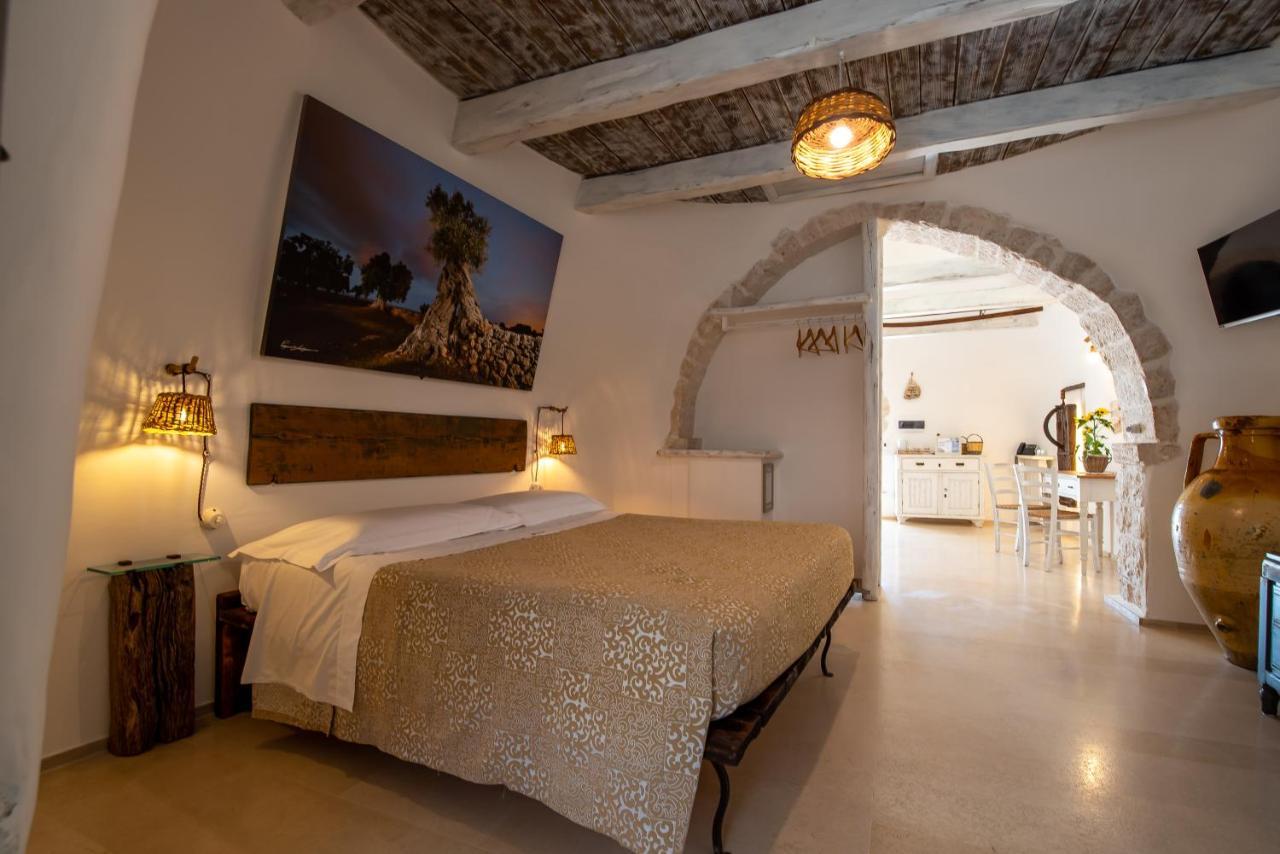 Trulli Holiday Deluxe & Wellness อัลเบโรเบลโล ภายนอก รูปภาพ