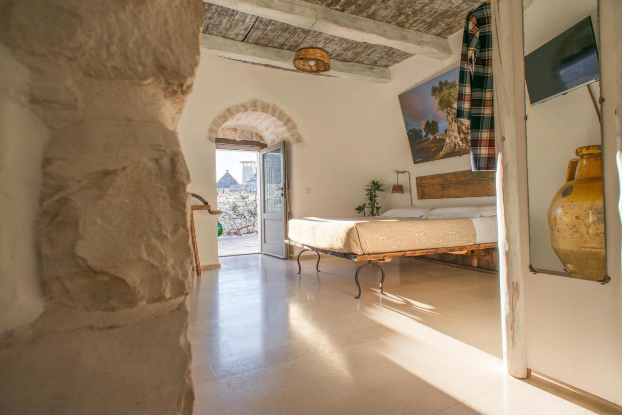Trulli Holiday Deluxe & Wellness อัลเบโรเบลโล ภายนอก รูปภาพ