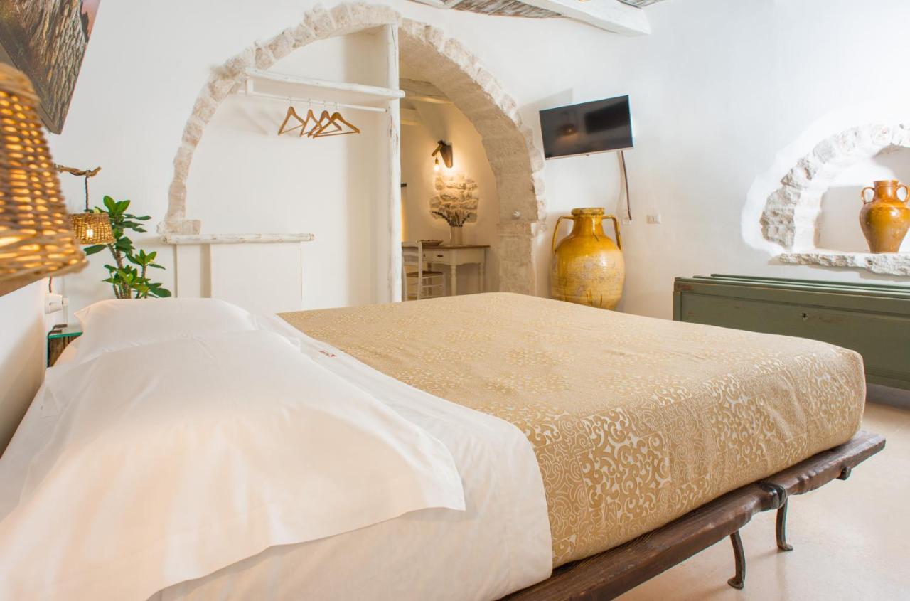 Trulli Holiday Deluxe & Wellness อัลเบโรเบลโล ภายนอก รูปภาพ